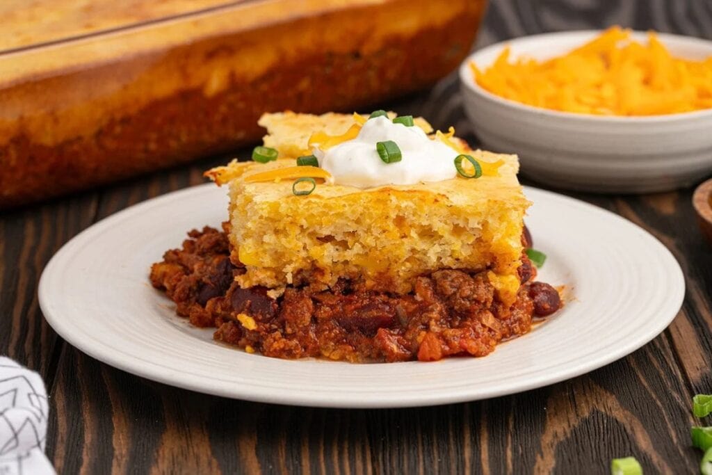 Slice of chili cornbread casserole on a plate.