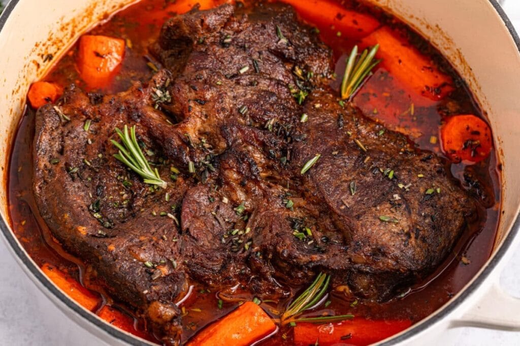 Dutch oven pot roast in a pot.