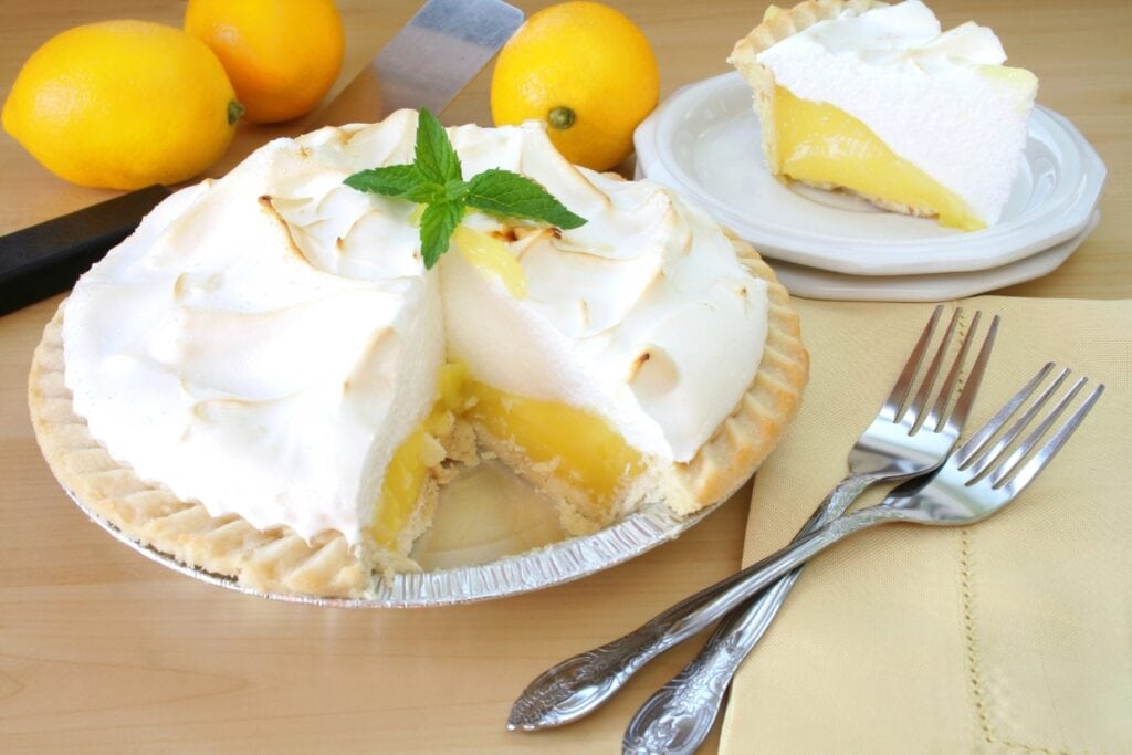 Lemon meringue pie on a table.