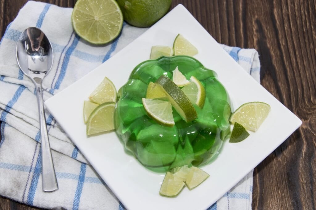 Lime green salad on a plate.