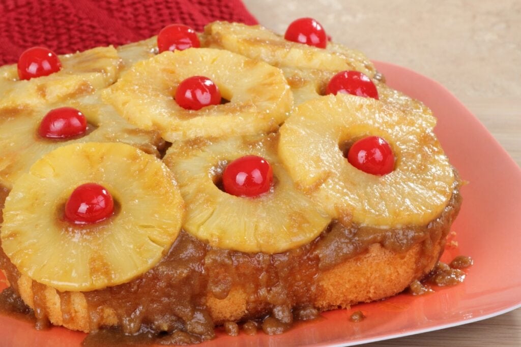 Pineapple upside-down cake on a plate.