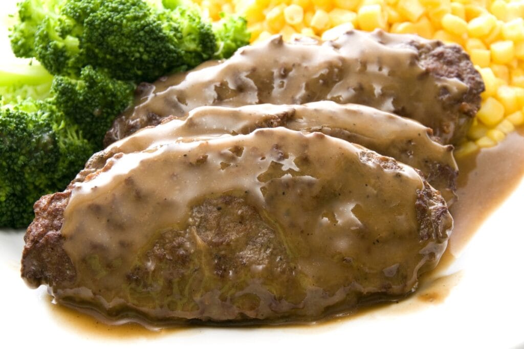 Salisbury steak on a plate.