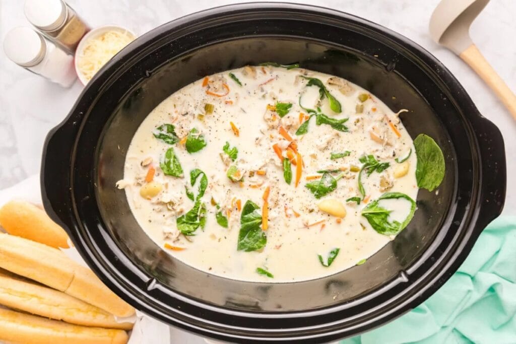 Chicken gnocchi soup in a slow cooker.