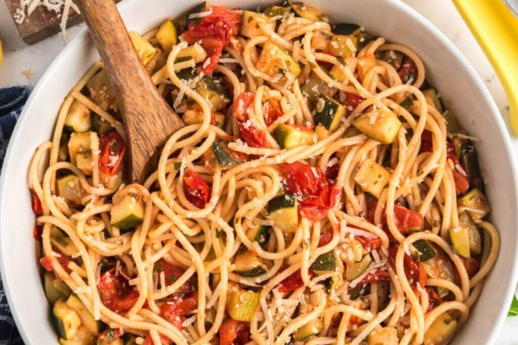 Zucchini tomato pasta in a bowl.