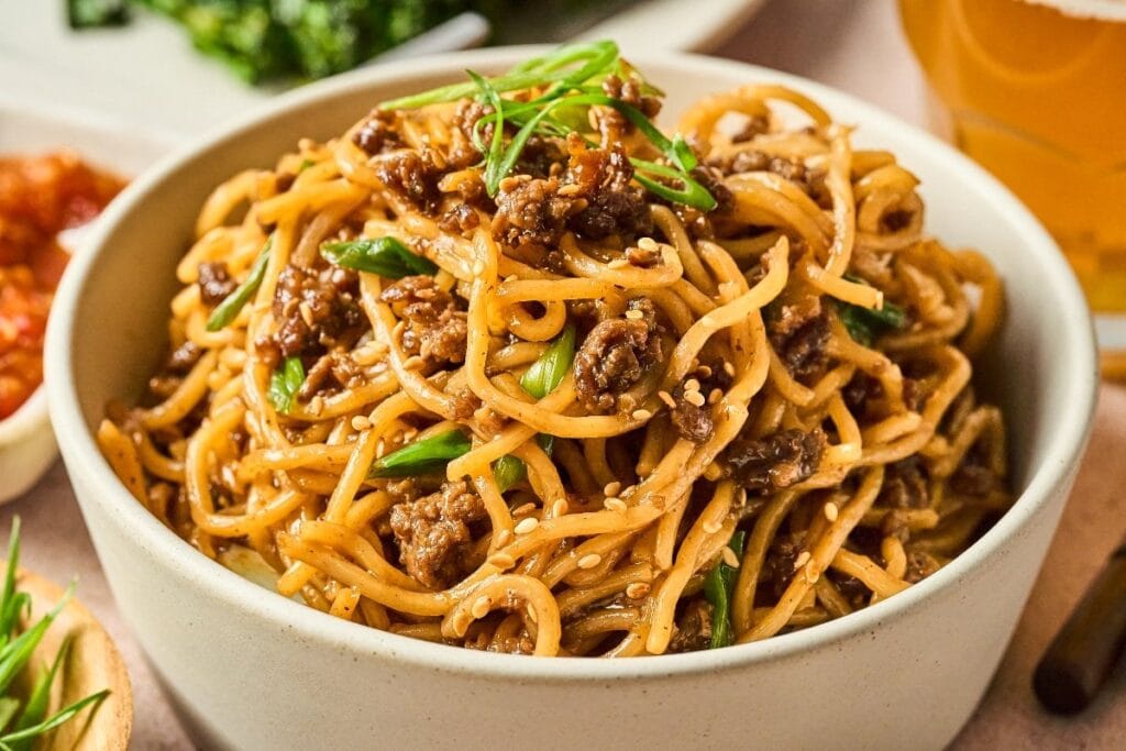 A close up shot of beef noodles.