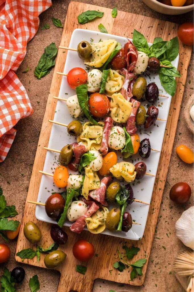 antipasto bites on white plate