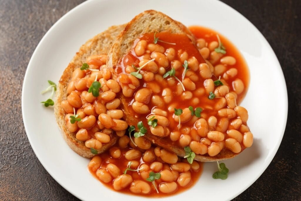 Beans on toast on a plate.