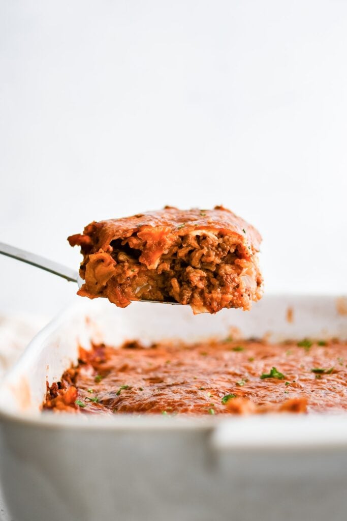 Cabbage roll casserole on a serving spoon.