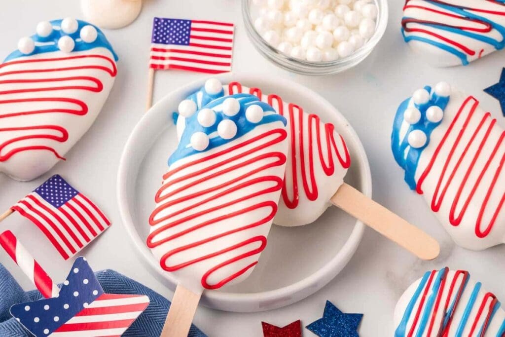 Cakesicles on a white plate.