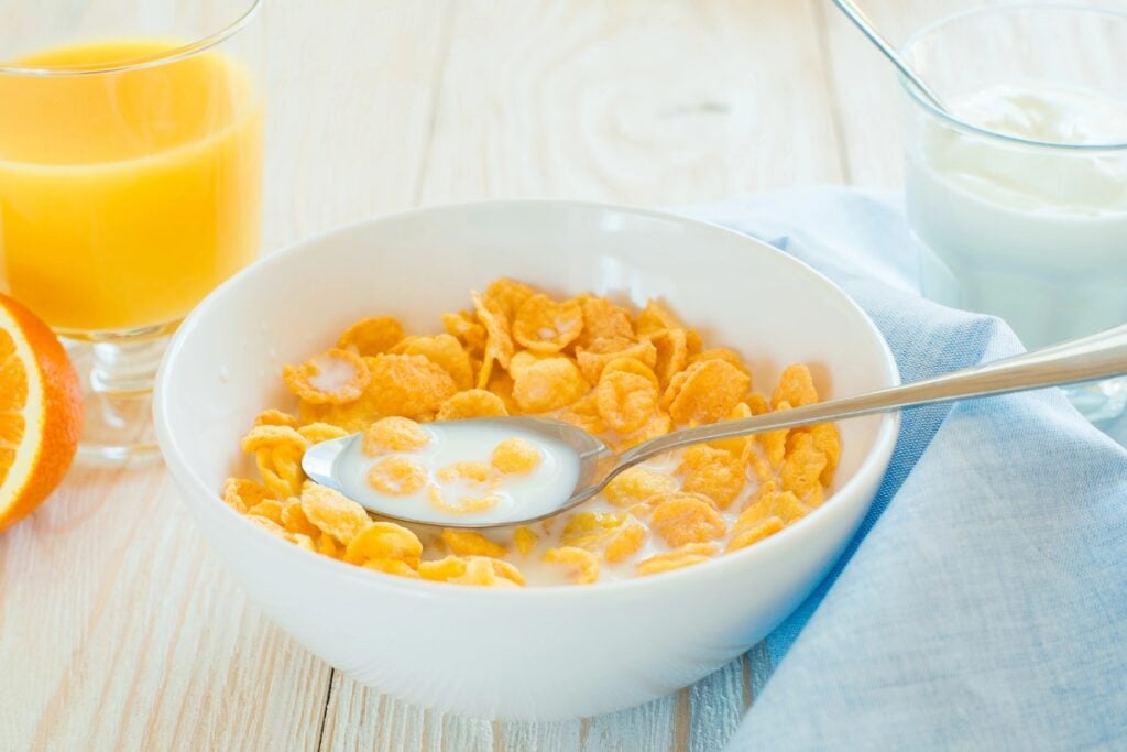 Cereal with milk in a bowl.