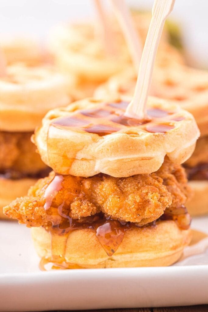 Chicken and waffle slider with maple syrup.