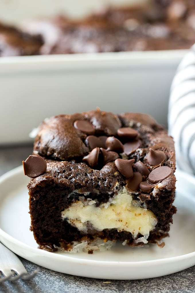 Slice of earthquake cake on a plate.
