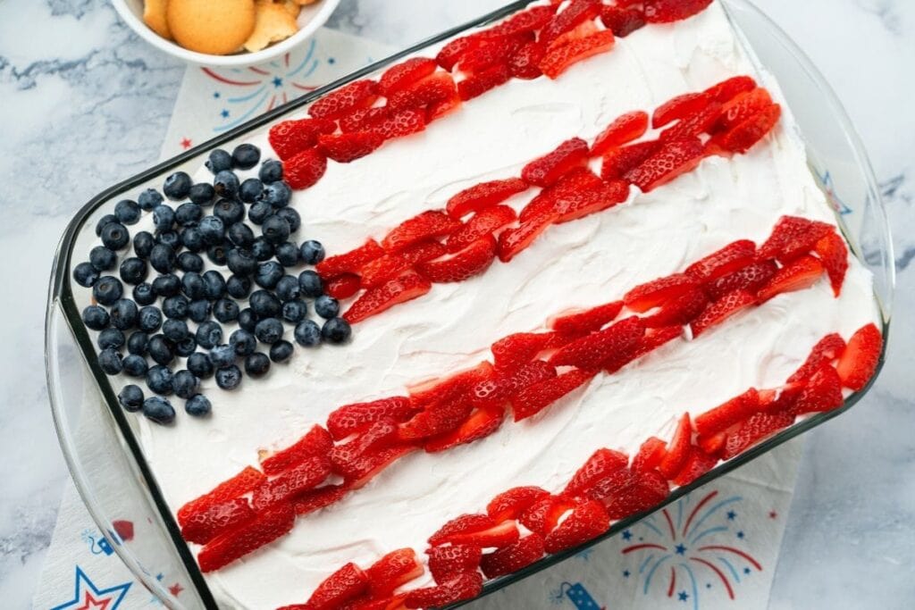 Flag icebox cake with banana pudding in a baking dish.