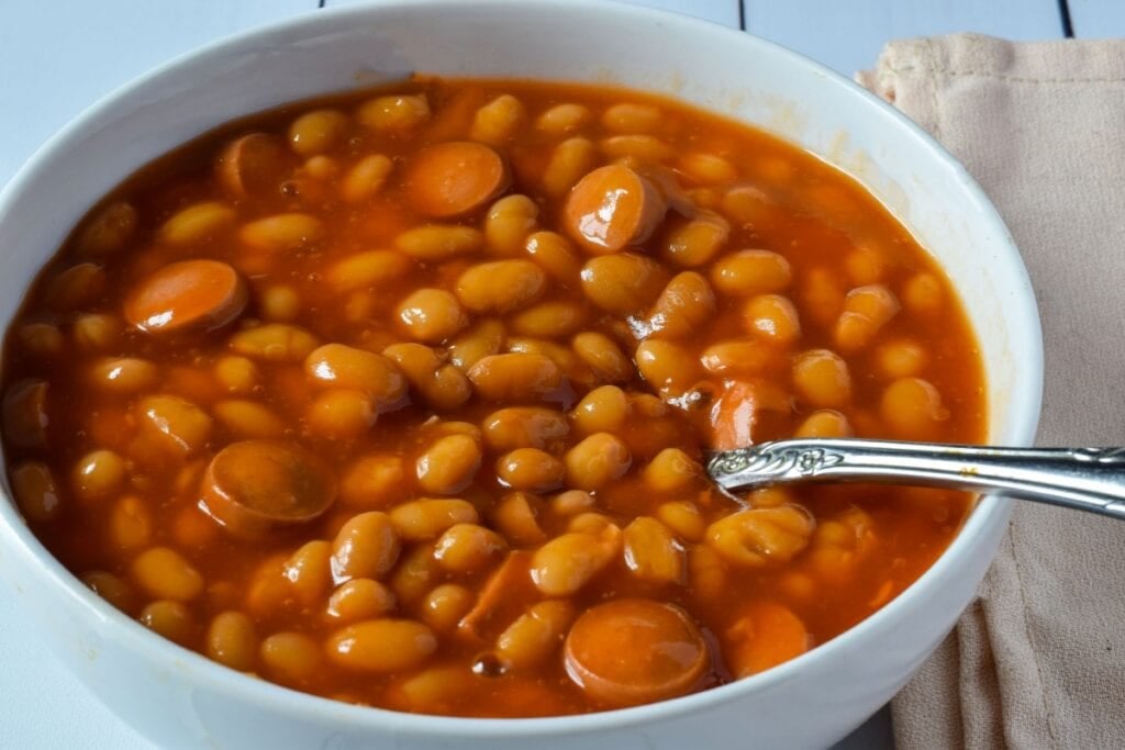 Franks and beans in a bowl.