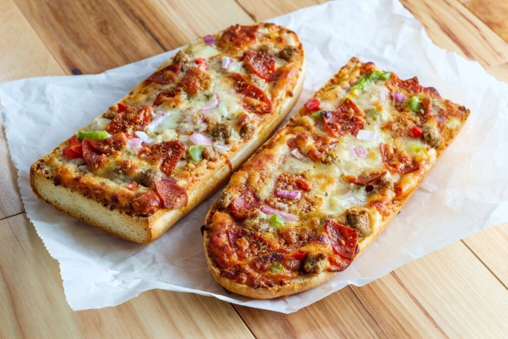 French bread pizza on a plate.