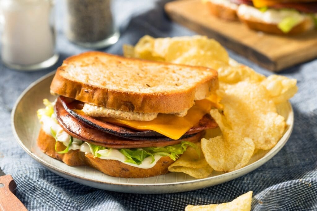 Fried bologna sandwich on a plate.