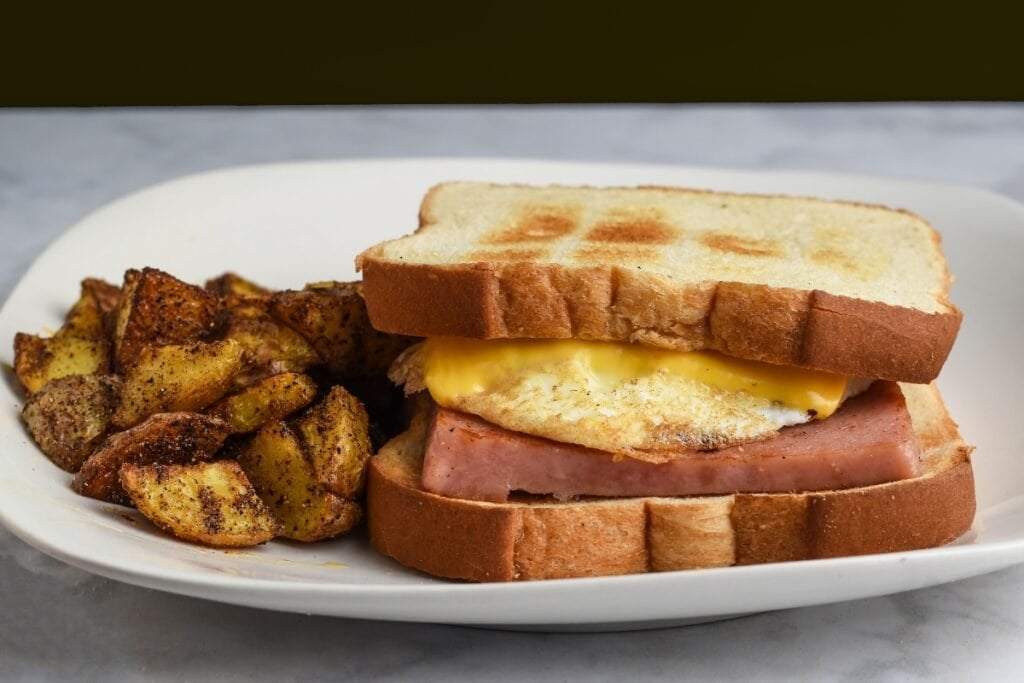Fried Spam sandwich on a plate.