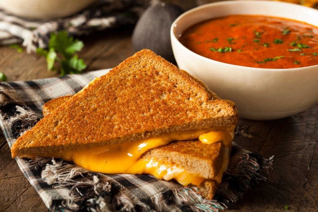Grilled cheese sandwich with tomato soup.