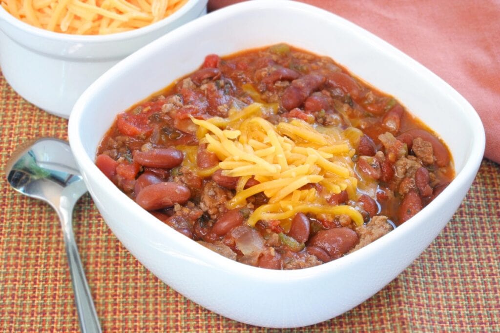 Ground beef with canned beans in a bowl.