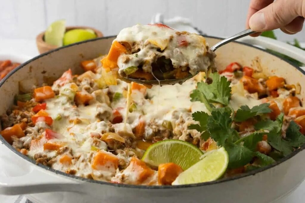 Cheesy ground turkey and sweet potato in a skillet.