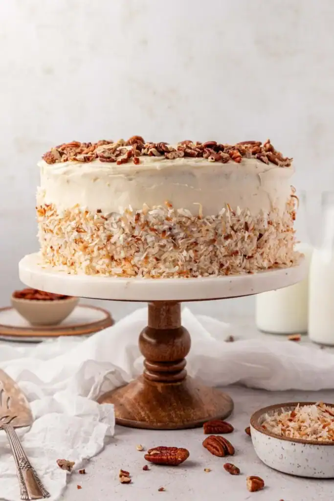 Italian cream cake on a cake stand.