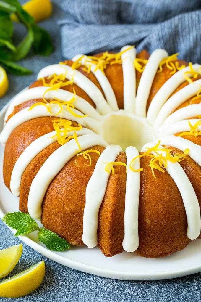 Lemon Bundt cake on a white plate.