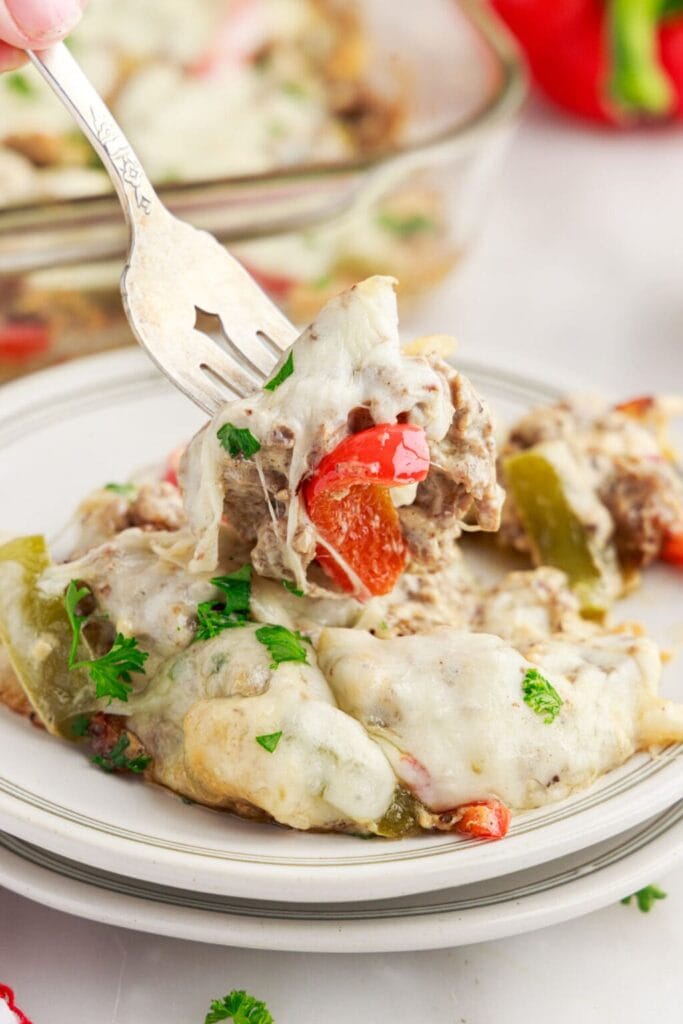 Philly cheesesteak casserole on a plate.