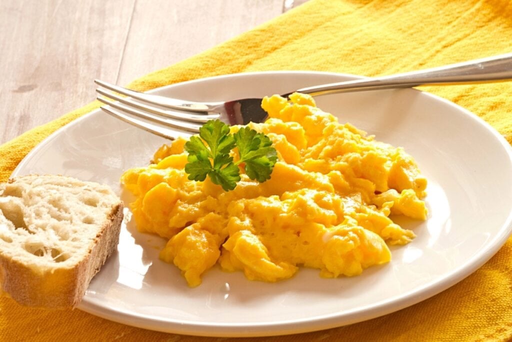 Scrambled egg on a plate.