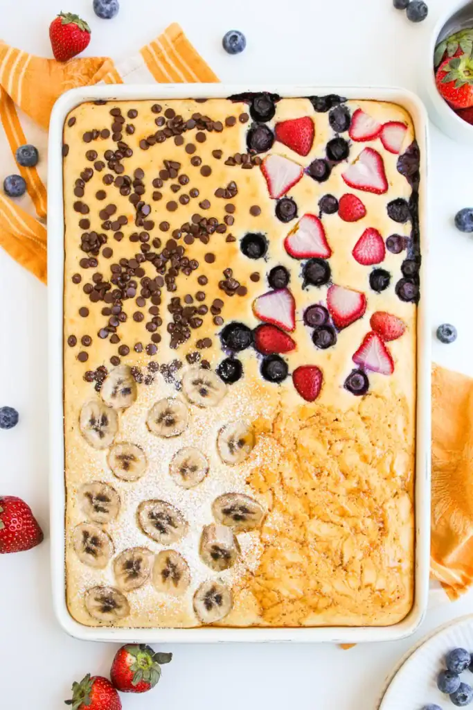 Sheet pan pancakes with fruit and chocolate chips.