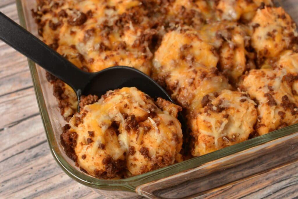 Close-up of sloppy joe bubble up casserole on a serving spoon