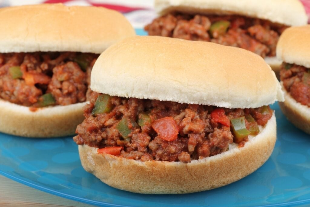 Sloppy joes sandwich on a plate.