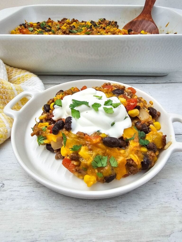 Serving of taco rice casserole on a plate.