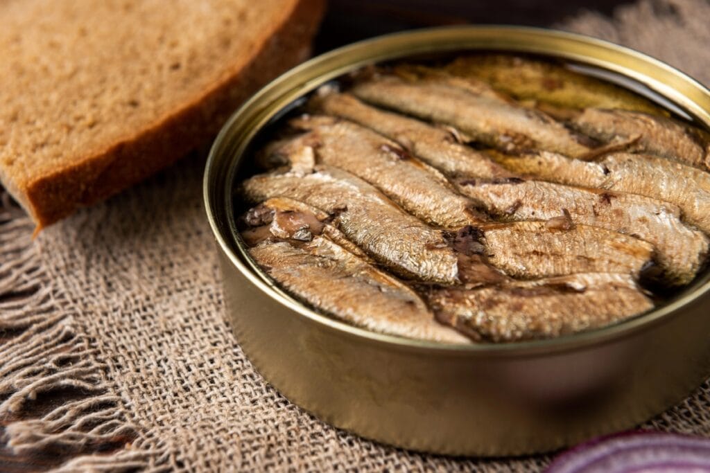 Tinned sardines in an open can.