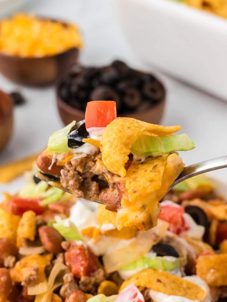 Walking taco casserole on a spoon.