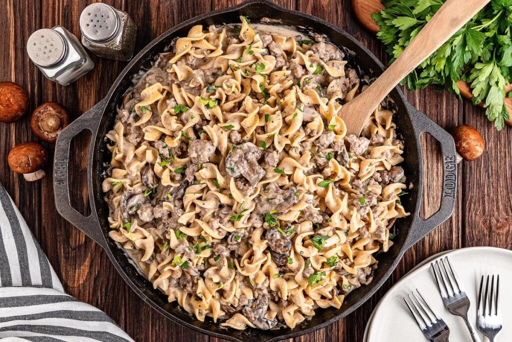 Ground beef stroganoff in a skillet.