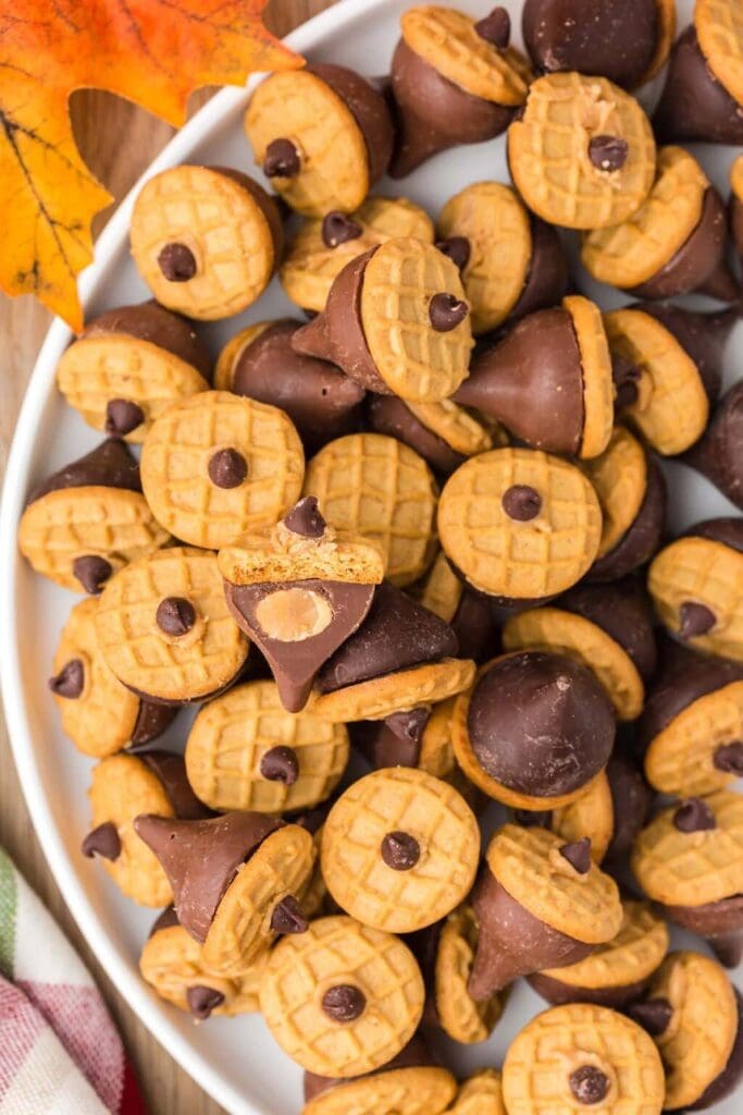 Hershey Kisses acorn treats on a plate.