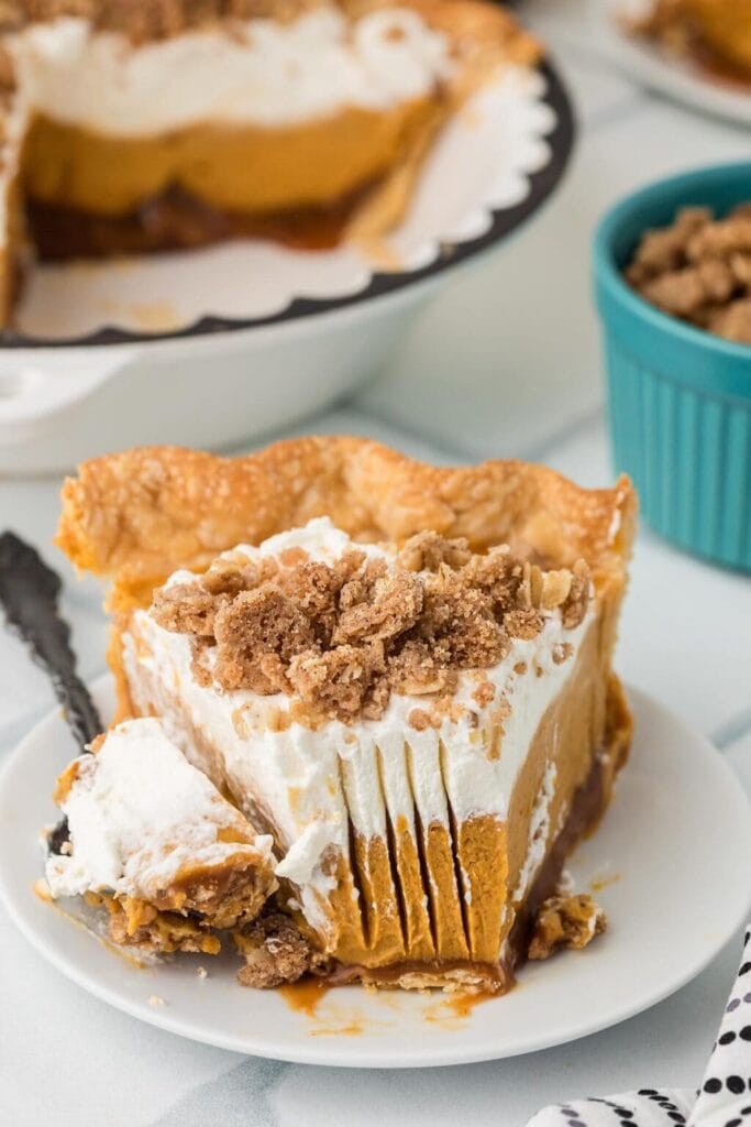 Slice of Milk Bar pumpkin pie served on a plate.