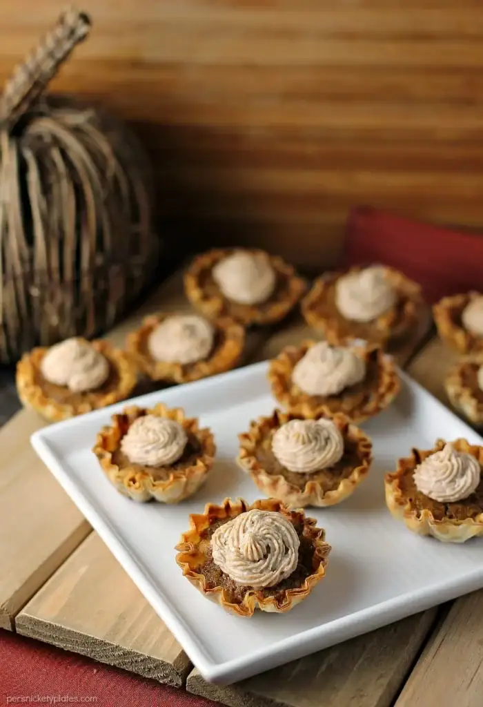 Mini sweet potato pies on a plate.
