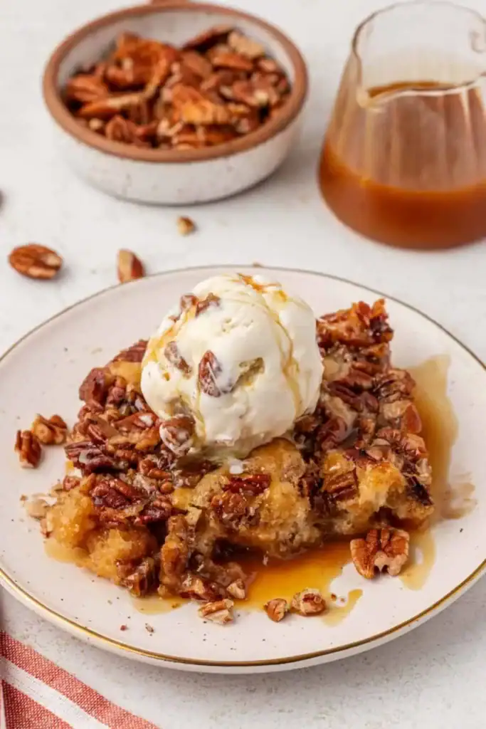 Pecan pie cobbler on a plate.