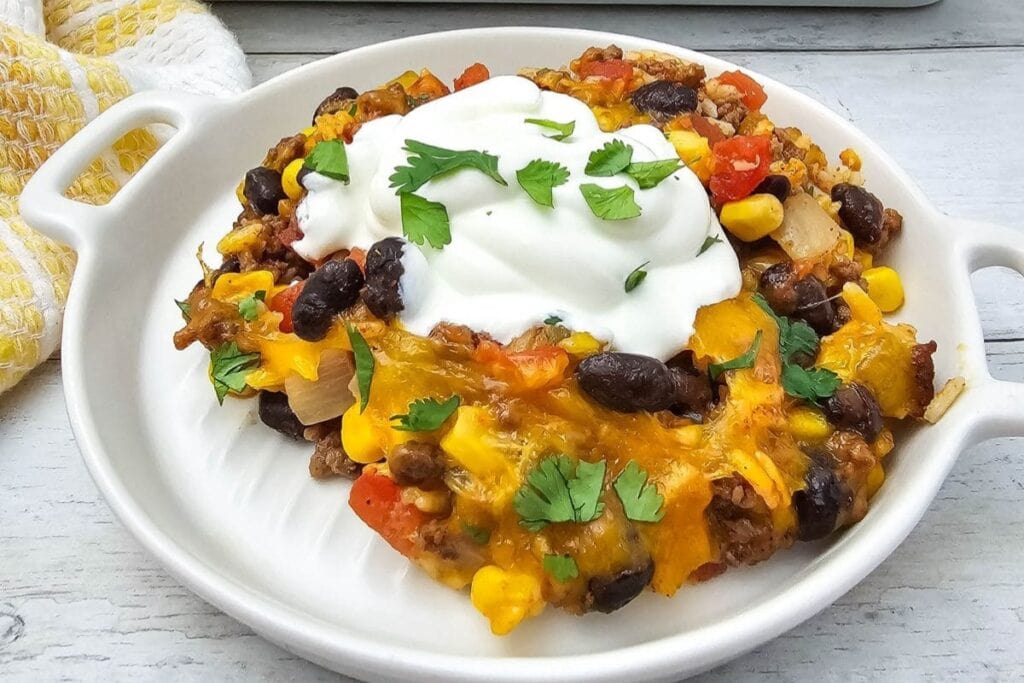 Taco rice casserole served on a plate.