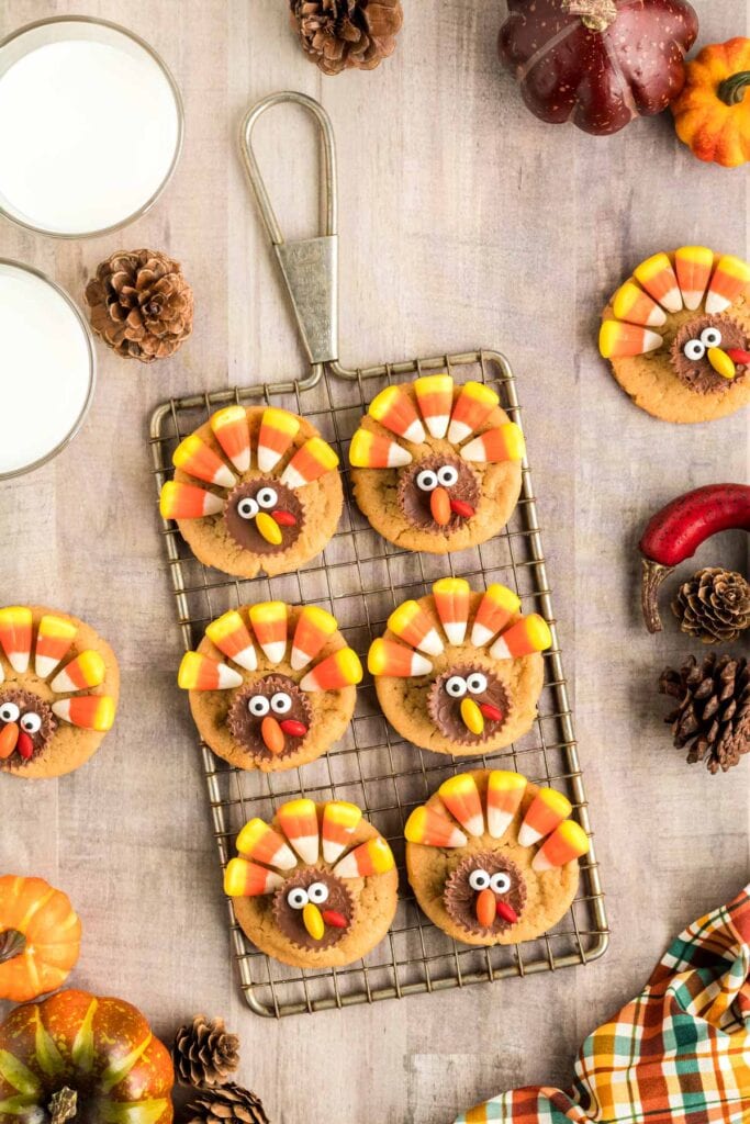 Thanksgiving turkey cookies on a cooling rack.