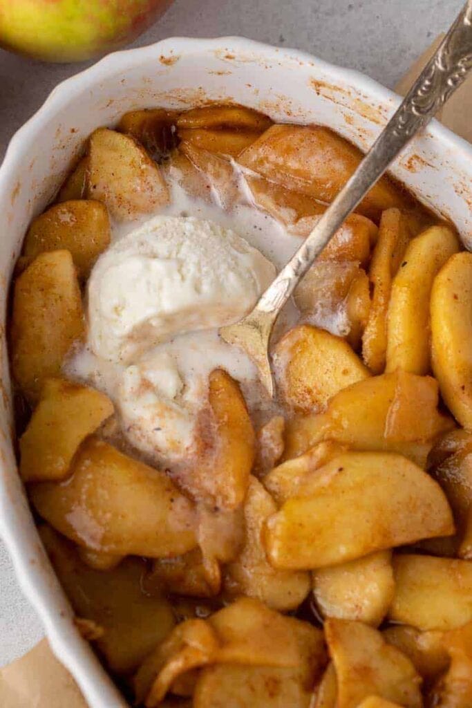 Baked apples in a baking dish.