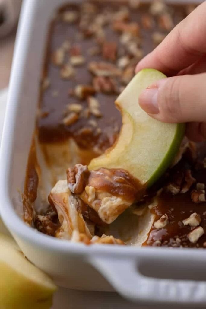 Caramel apple cheesecake dip in a baking.