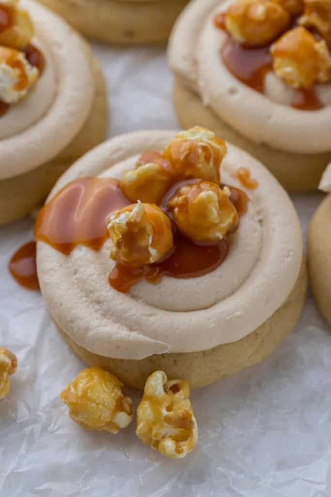 Caramel popcorn cookies on parchment paper.
