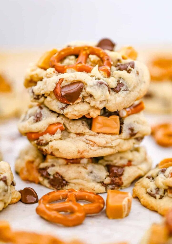 Close-up stack of caramel pretzel chocolate chip cookies.