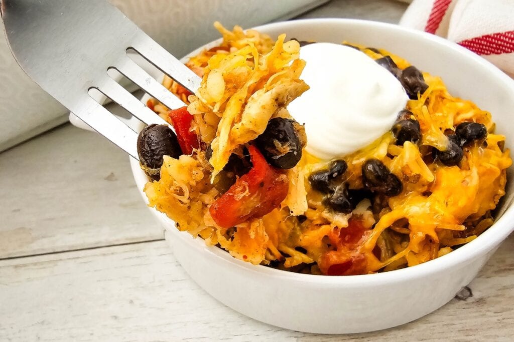 Chicken Taco Casserole served with sour cream.