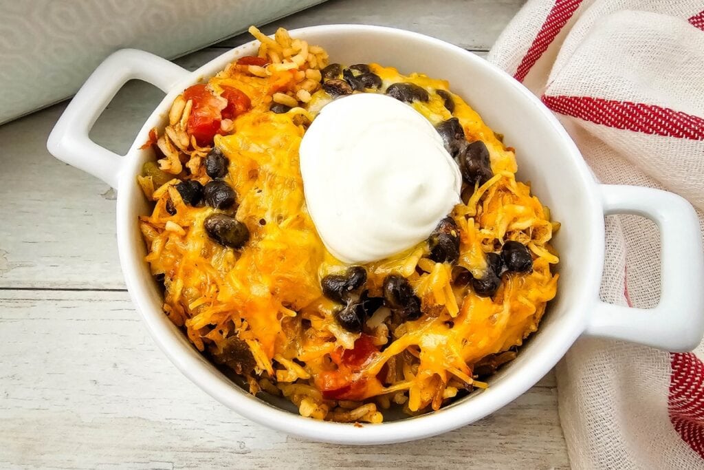 Chicken Taco Casserole served with sour cream.
