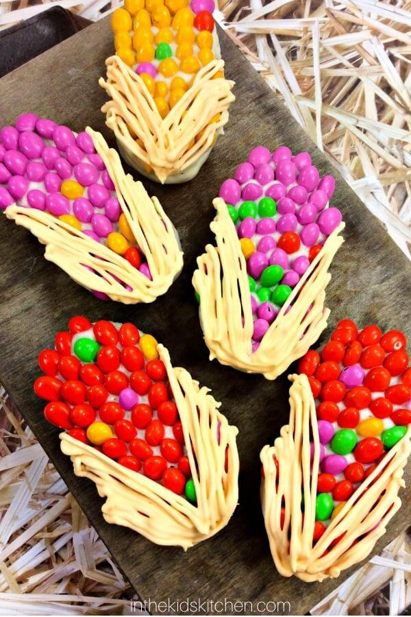 Harvest corn cookies on a wooden board.