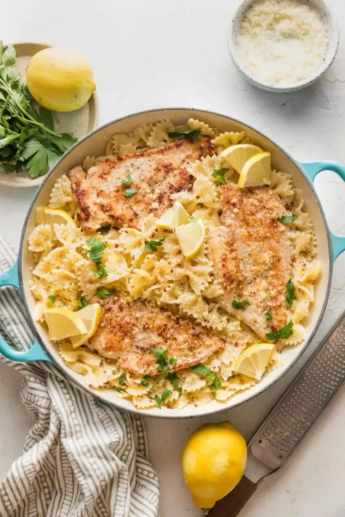 Lemon chicken pasta in a pot.
