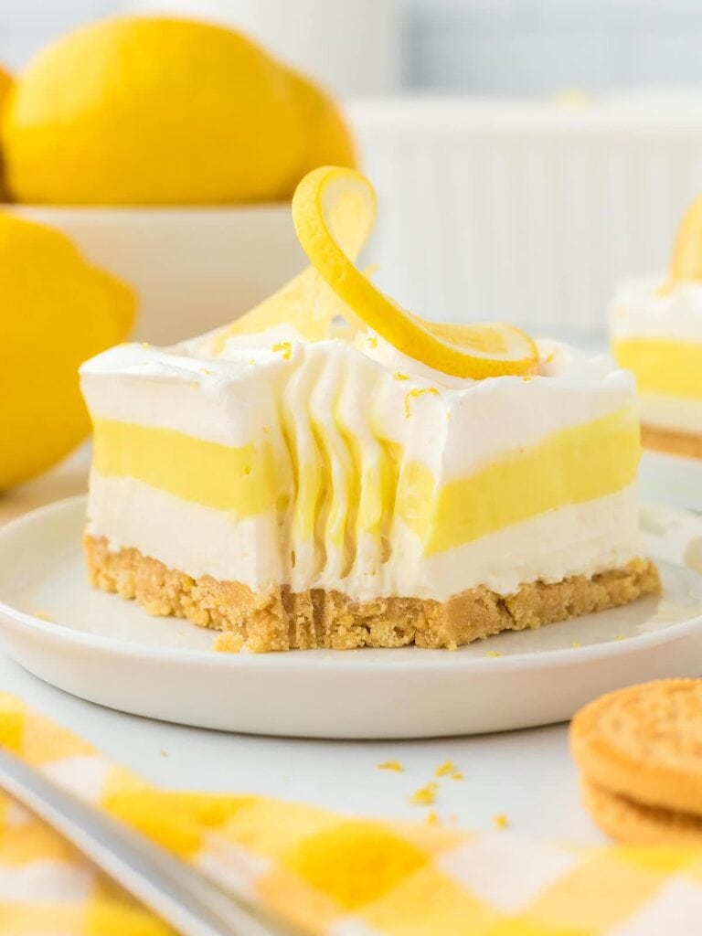 Slice of lemon lush on a plate.